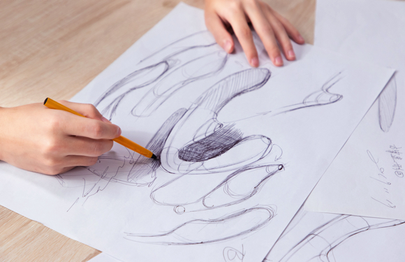 designer is sketching the design of g spot vibrator